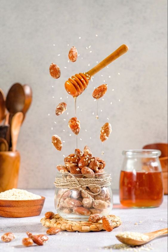 Mix honey with almonds